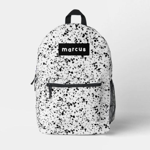 Playful artistic black splatter on white with name printed backpack