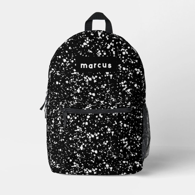 Playful artistic white splatter on black with name printed backpack (Front)