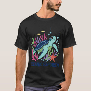 Playful Cartoon Sea Turtle Exploring Colorful Cora T-Shirt