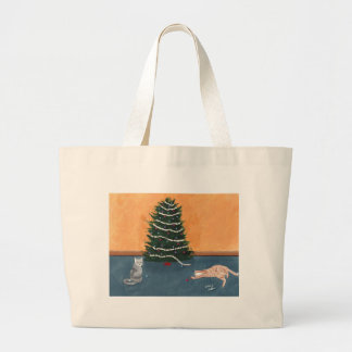 Playful cats by the Christmas tree canvas bags