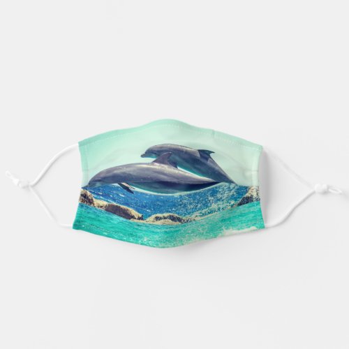Playful dolphins blue sky and ocean_ bestseller adult cloth face mask