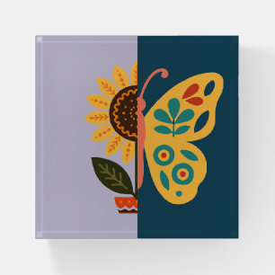 Playful floral and butterfly design paperweight