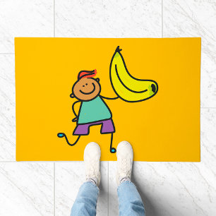 Playful Kid Holding Big Yellow Banana Doormat