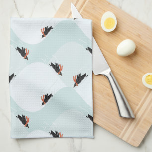 Playful Penguins Sliding on Snow Pattern Kitchen Towel