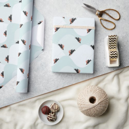 Playful Penguins Sliding on Snow Pattern Wrapping Paper