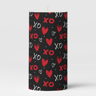 Playful Red & Black XO Heart Pattern on Black Pillar Candle