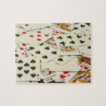 Playing Cards Puzzle<br><div class="desc">Playing cards scattered on a table,  10" x 8" puzzle. 110 pieces.</div>