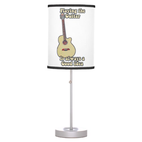 Playing the guitar is always a good idea table lamp