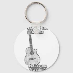 Playing the guitar makes me awesome. black & white keychain