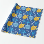 Pleasant Dreidel Hanukkah Wrapping Paper<br><div class="desc">If you love nice quality heavy duty wrapping paper,  you will love this item.  Displaying a pleasant Hanukkah design with blue and gold dreidels,  the images are shown on a blue background.  There are Hebrew letters.  Purchase your Hanukkah wrapping paper today! 


Hanukkah pattern design:  AMBillustrations 
http://www.etsy.com/shop/AMBillustrations/</div>