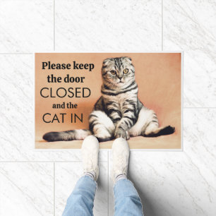 please keep the door closed and the cat(s) in doormat