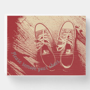 please remove your shoes sign with shoes