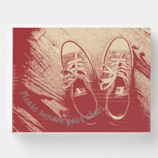 please remove your shoes sign with shoes