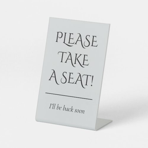 PLEASE TAKE A SEAT PEDESTAL SIGN