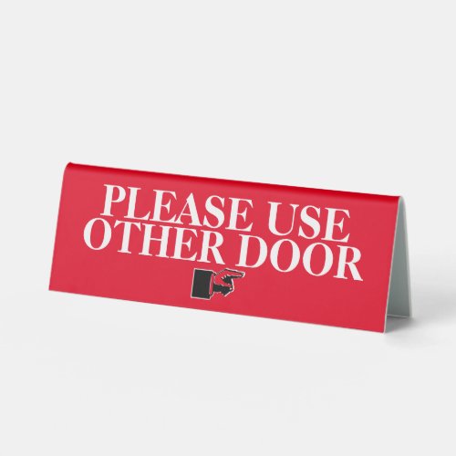 Please use other door finger pointing red black table tent sign