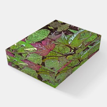 "plum-colored Leaf Among Green Leaves" Paperweight by whatawonderfulworld at Zazzle