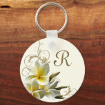 Plumeria Flourish Monogram Initial Keychain<br><div class="desc">Key ring with white plumeria flowers and place for a single initial. Pretty Hawaiian frangipani cluster with buds and yellow centers decorate one side of this round key ring - or choose a double-sided style. Add a single initial for a first or last name. Off white color with brown flourish...</div>