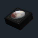 Pluto Gift Box<br><div class="desc">Pluto is the largest dwarf planet in the solar system. It was discovered by Clyde Tombough in 1930. In 2006 the New Horizons spacecraft launched to image it. This image was taken in 2015,  and reveals the geological diversity of Pluto's surface.</div>