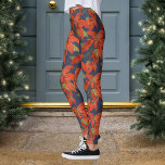 Poinsettia Christmas Leggings<br><div class="desc">Poinsettia pattern with custom background color. They would be great to add to your ugly sweater ensemble.
Complete the look with some christmas tree earrings :)</div>