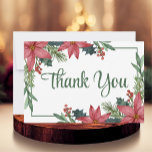 Poinsettia Red Floral Christmas Wedding Thank You Card<br><div class="desc">Expressing gratitude to loved ones has never been simpler with this delightful red floral wedding thank you card. The design showcases a beautiful watercolor red poinsettia surrounded by lush greenery, with an elegant script and easy-to-read fonts conveying the thank you message. You have ample space on the blank back of...</div>