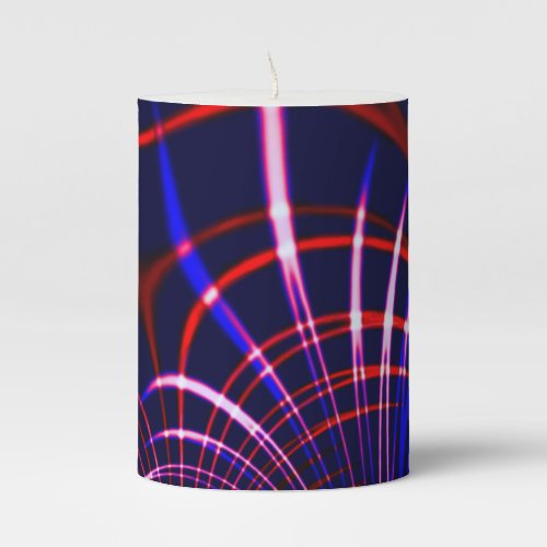 Pointed curves from blue to red white and pink pillar candle
