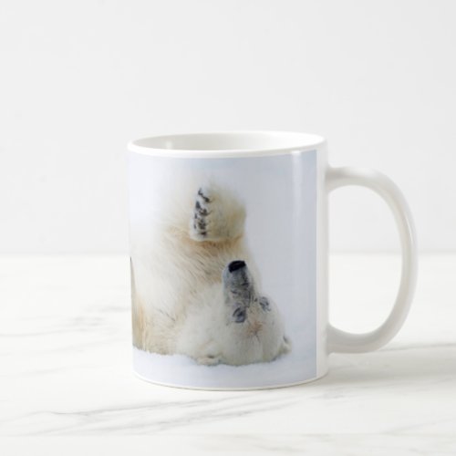 Polar bear rolling in snow Norway Coffee Mug