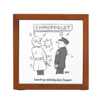 Police investigate a break-in at the Chiropodist Desk Organizer