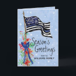 Police Thin Blue Line Flag Seasons Greetings Holiday Card<br><div class="desc">This holiday card for police and law enforcement features an artistically painted thin blue line American flag decorated with red berries and sprigs of pine.. The front of the card reads "Season's Greetings" with your name to personalize. Inside of the card has a custom message with your signature. Designed by...</div>