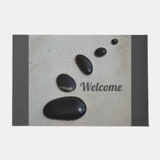 Polished Black Stones on Sand Zen Garden Gray