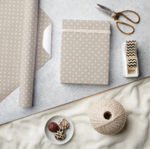 Polka dots on a textured beige  wrapping paper