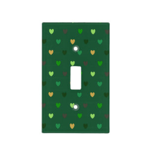 Polka hearts on forest green light switch cover