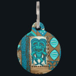 Pomaika’i Tiki Hawaiian Vintage Tapa Pet Name Tag<br><div class="desc">Teal, turq, aqua, cocoa and natural colorway. It is "good fortune" to have the Tiki God Ku protect you. We have surrounded him with pineapples, tribal staffs, graphic flowers and tapa elements in this whimsical design that is reminiscent of the Aloha shirt designs of the forties and fifties. There are...</div>