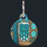 Pomaika’i Tiki Hawaiian Vintage Tapa Pet Name Tag<br><div class="desc">Teal, turq, aqua, cocoa and natural colorway. It is "good fortune" to have the Tiki God Ku protect you. We have surrounded him with pineapples, tribal staffs, graphic flowers and tapa elements in this whimsical design that is reminiscent of the Aloha shirt designs of the forties and fifties. There are...</div>