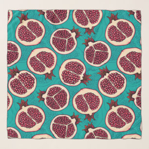 Pomegranate slices on turquoise scarf