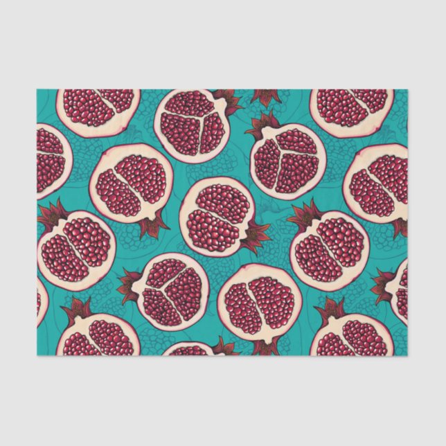 Pomegranate slices on turquoise tissue paper (Front)