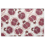 Pomegranate slices on white fabric
