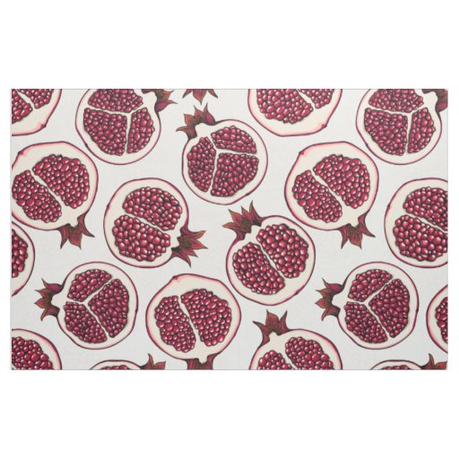 Pomegranate slices on white fabric