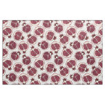 Pomegranate slices on white fabric