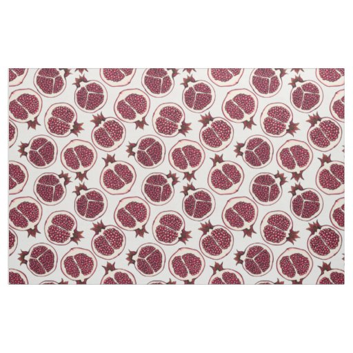 Pomegranate slices on white fabric