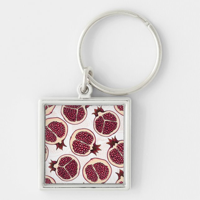 Pomegranate slices on white keychain (Front)