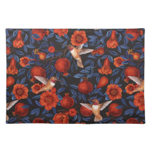 Pomegranates and hummingbirds/blue leaves on black cloth placemat