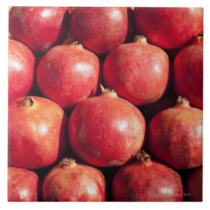 Pomegranates on display at the Carmel Market Tile