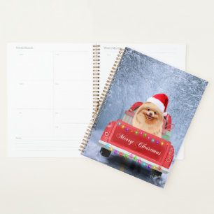 Pomeranian Dog in Snow sitting in Christmas Truck Planner