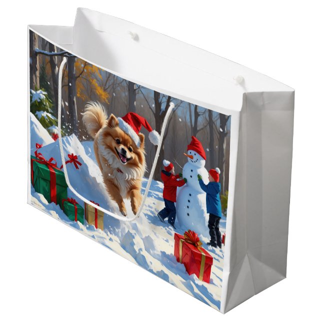 Pomeranian Running in Snow with Christmas Hat Large Gift Bag (Front Angled)