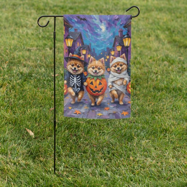 Pomeranian Trick-or-Treating in Halloween Costumes Garden Flag (In SItu)
