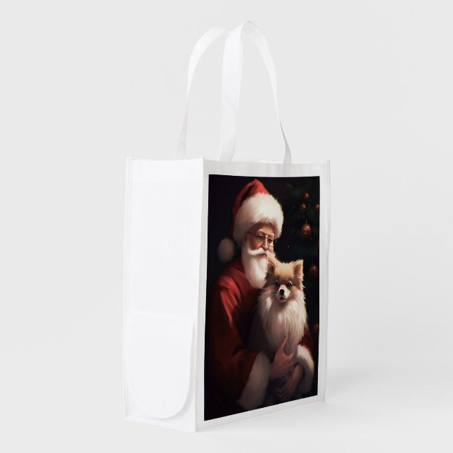 Pomeranian With Santa Claus Festive Christmas  Grocery Bag (Front Side)