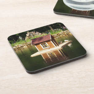 Pond with bird house and alphine slide beverage coaster