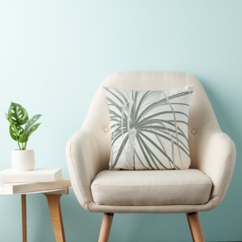 Ponytail palm foliage on white throw pillow