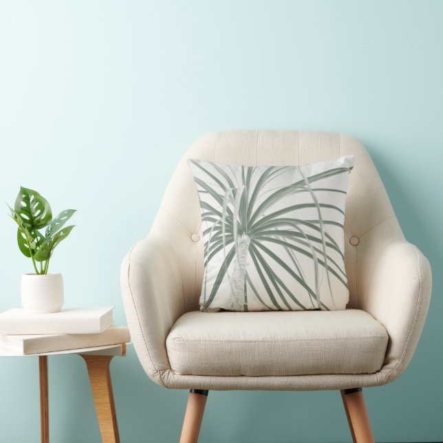 Ponytail palm foliage on white throw pillow (Chair)