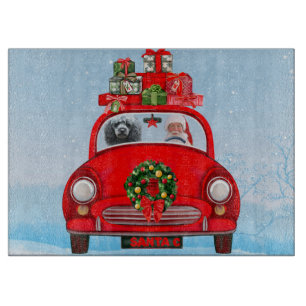 Poodle Dog In Car With Santa Claus Cutting Board